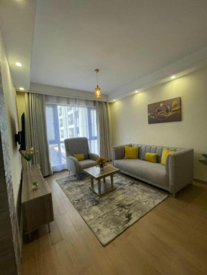 spacious luxury apartment with amazing scenic views heated swimming pool , fully equipped gym,private parking space and proximity to major shopping malls